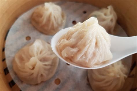  Xinxiang Xiaolongbao: Welche köstliche Balance aus zarter Füllung und knuspriger Teigschicht verbirgt sich darin?